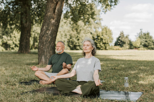 two people meditating